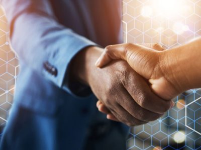 handshake after negotiation of a successful business deal