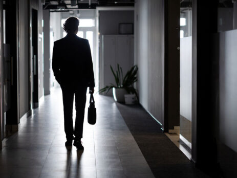 Business owner walking out of business