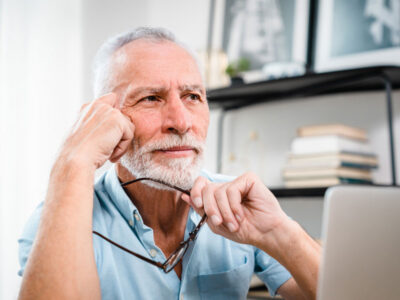 Man pondering a business decison