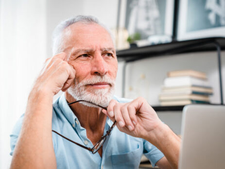 Man pondering a business decison